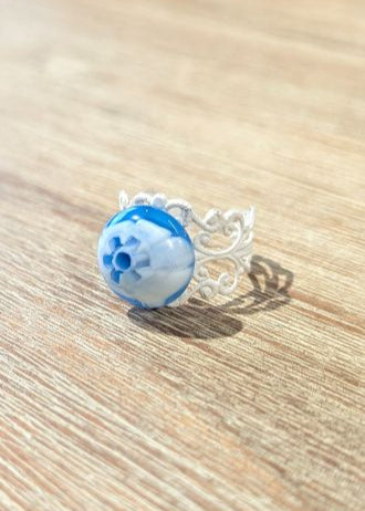 Handgemaakte ring in glas met millefiori bloempje
